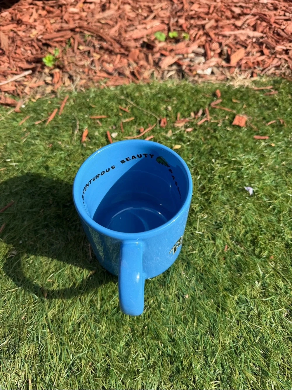 RAINFOREST CAFE Blue Mug with Parrot Graphic